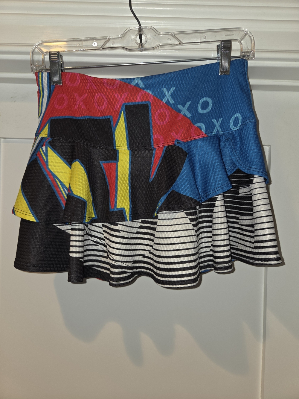 Lucky in Love Multicolor Graphic Ruffle Skirt in Blue, Red, Yellow & Black